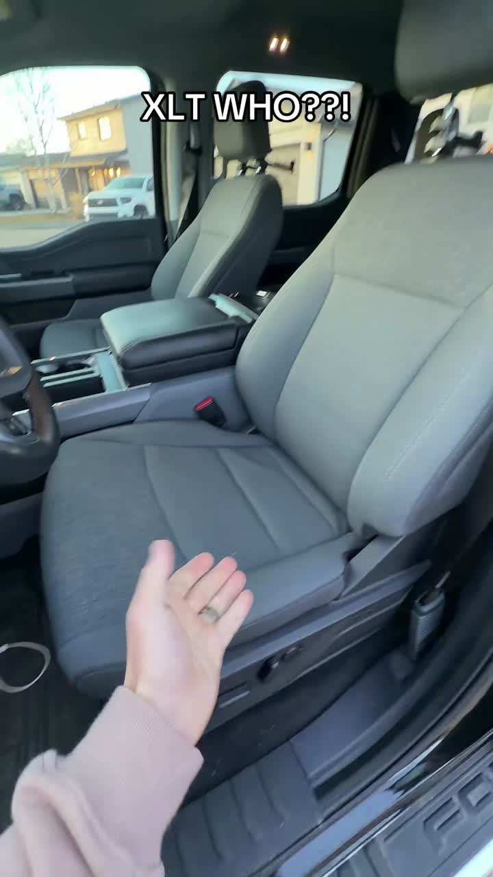 Before: grey cloth front seat in a truck